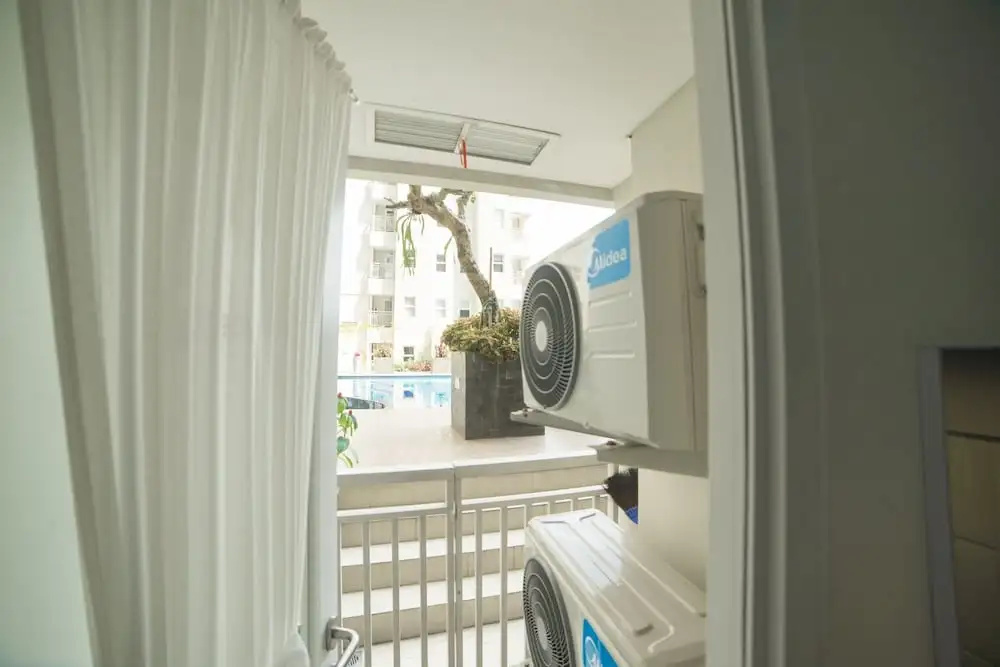 Cozy Apartment at Parahyangan Residence with Direct Access to Swimming Pool