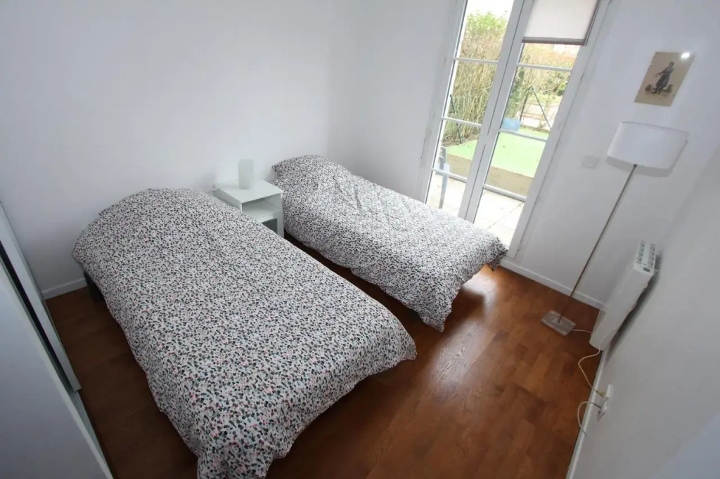 Appartement face Vallée Village et très proche Disney