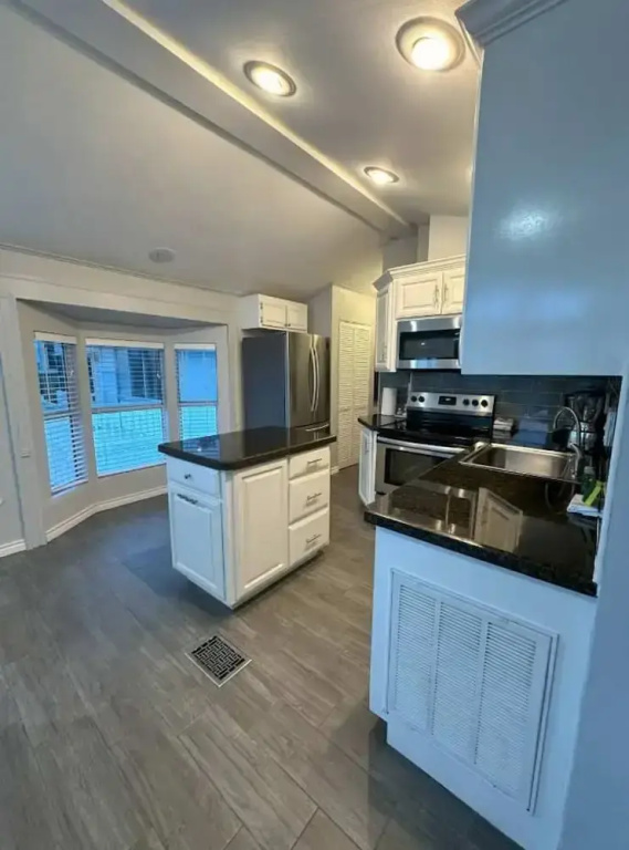 Stylish 2BR Waterfront Home w Pool Resort Access