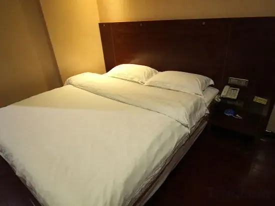 7 xing Ge Business Hotel