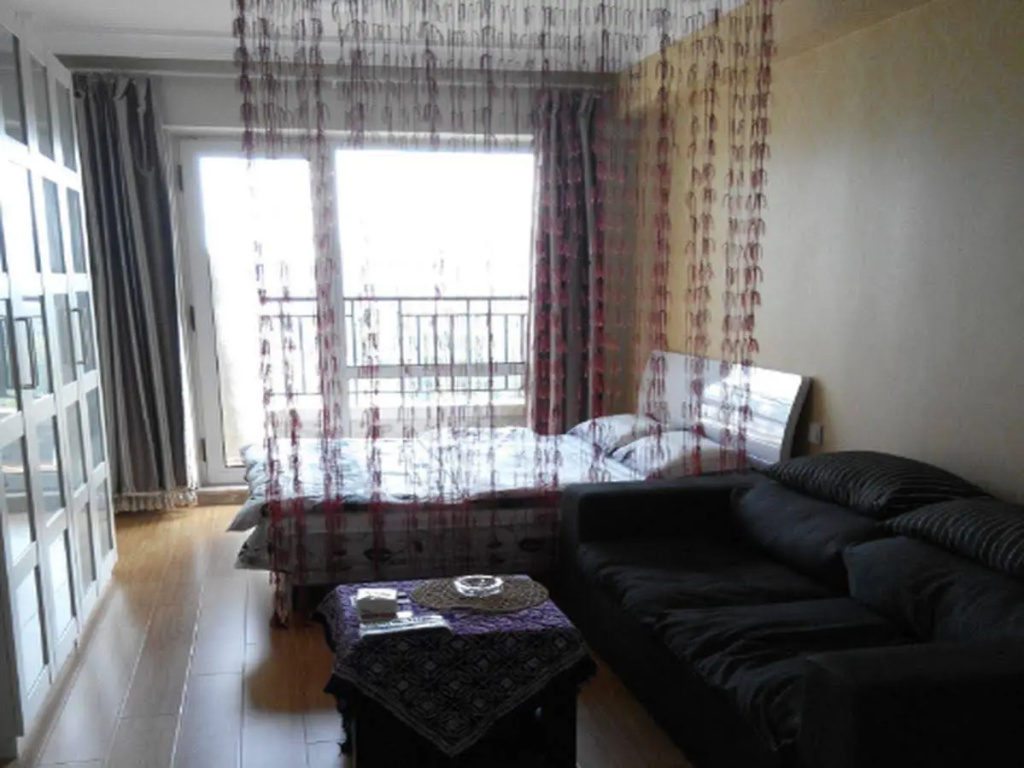 Dalian Hehe Apartment Hotel