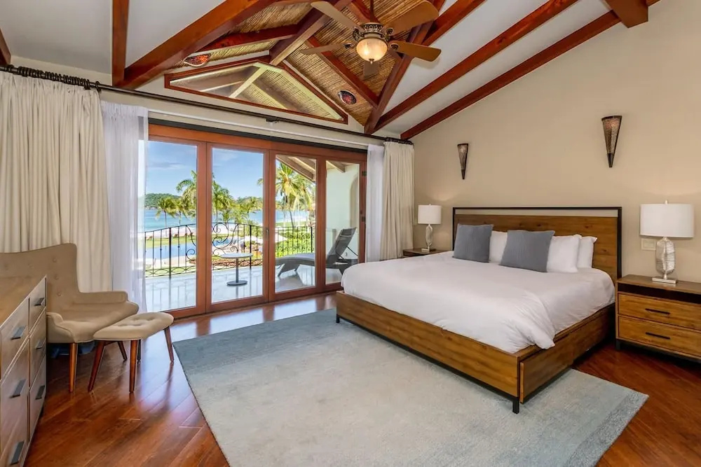 Stylish Split-Level Condo with a Shaded Terrace, Direct Beach Access, and Resort-Style Community Amenities