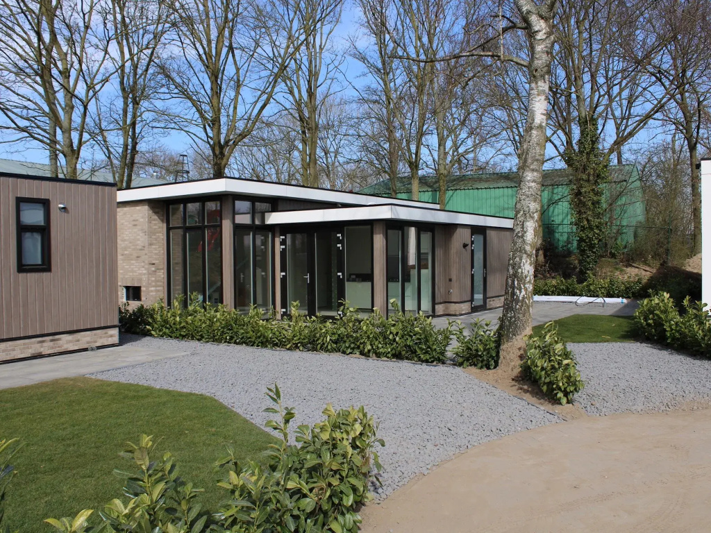 Wellness chalet with a sauna, in a holiday park directly on a recreational lake