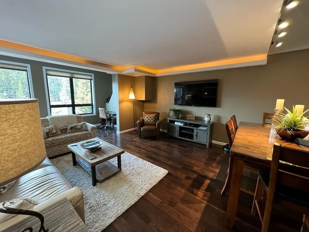 DELUXE SLOPESIDE Condo with 4th FLOOR VIEWS, Elevator and Underground Parking at Canyon Lodge (1849 Condos 409) by RedAwning