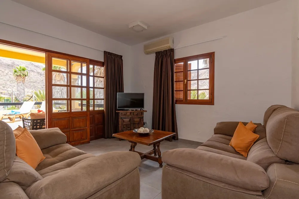 Casa de vacaciones con piscina compartida en Mogán IV