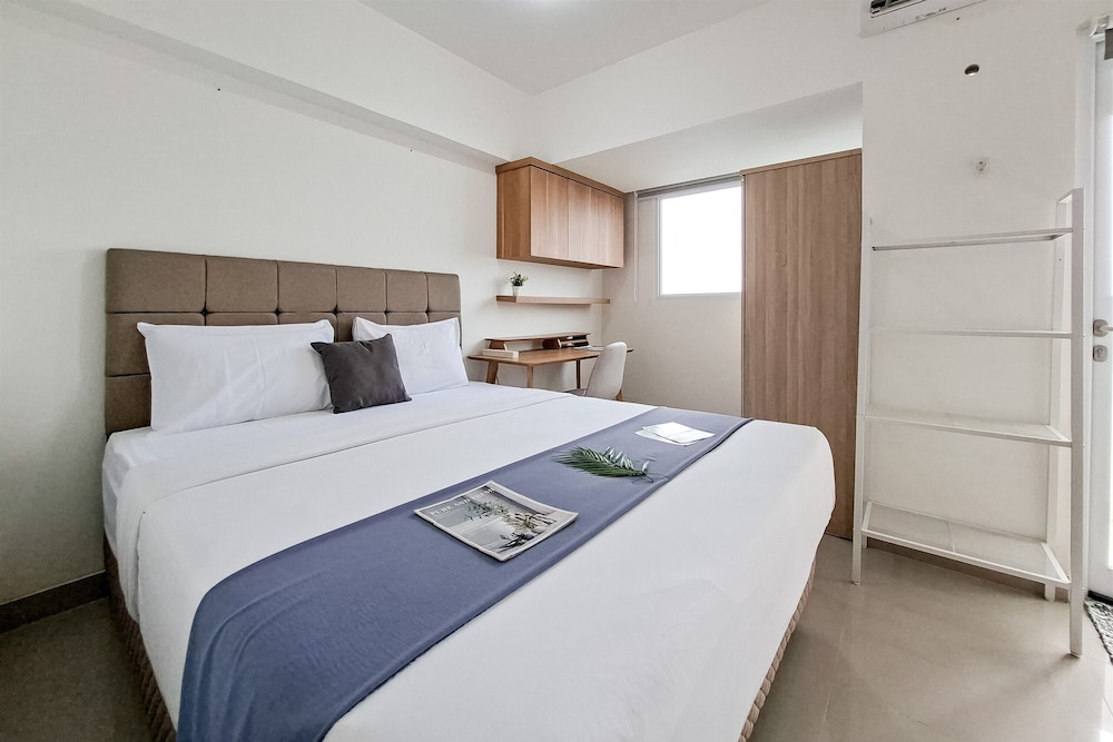 Compact White Studio At Cisauk Point Apartment