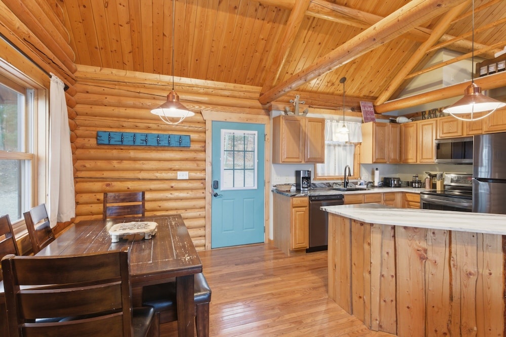 Lakefront Log Cabin With Private Dock, Two Decks & Cozy Comfort at 35mm in Sunrise Beach