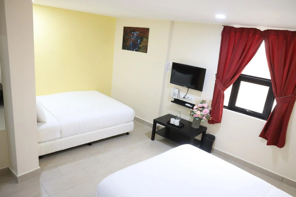 Capital O 90897 Island City Hotel