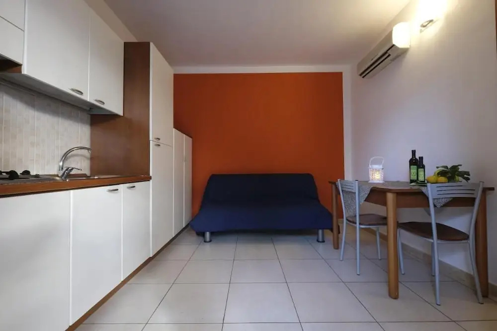Apartment ulivo with pool and private beach