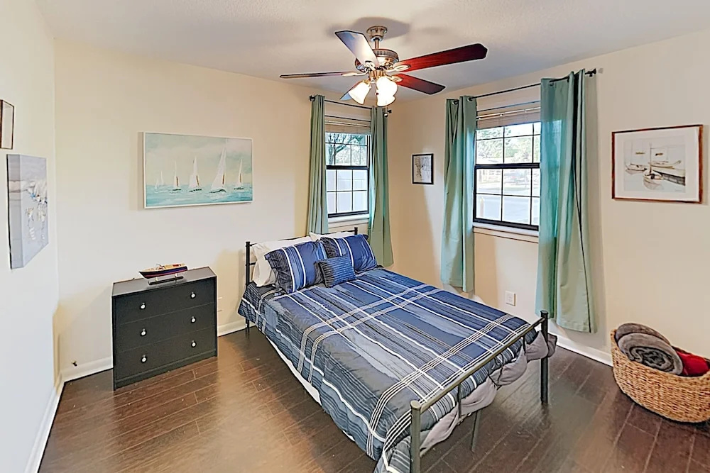 Updated W/ Gated Pool & Screened-in Porch 4 Bedroom Home