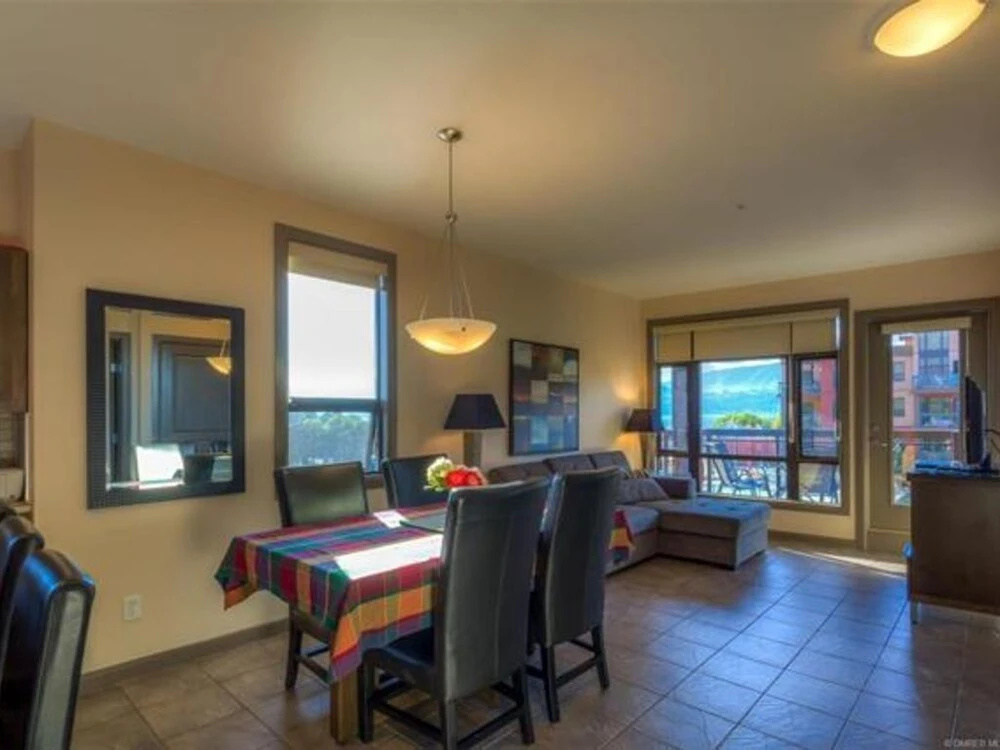 Bright Corner Unit with Lake and Pool Views #543