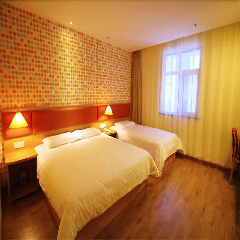 Home Inn Yangquan Peach West Street to the North is the International new City Shop