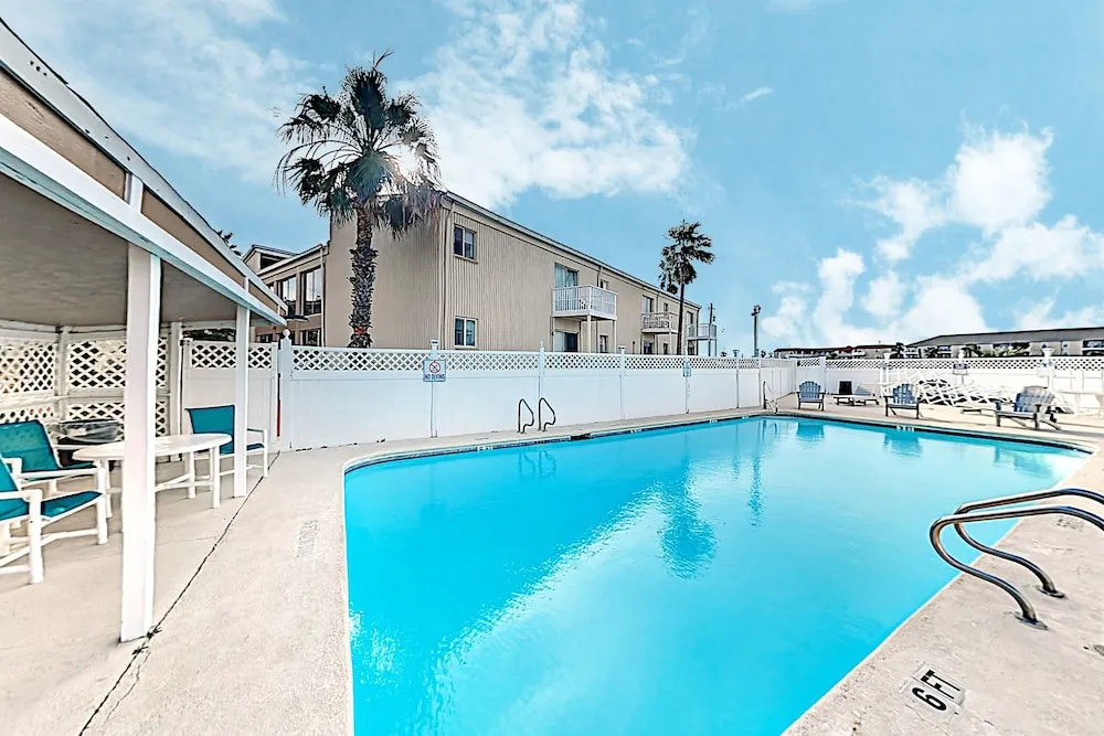 Lovely Canal-front W/ Pools & Boat Slip 2 Bedroom Condo
