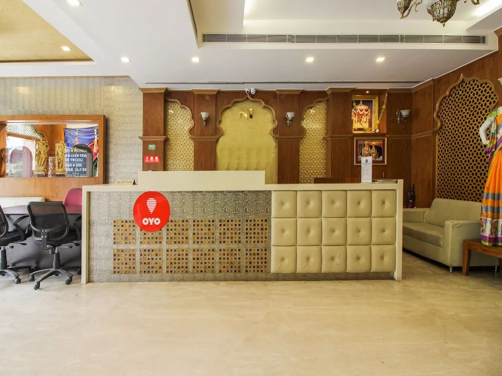 Capital O 15964 NI Ambaari Suites