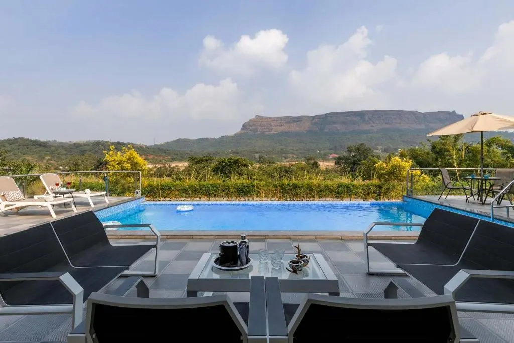 StayVista's The Tavern At Canary Farms - Mountain-View Luxury Mansion with Infinity Pool & Games Zone