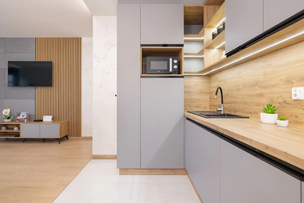 Dark Blue Apartment in Kraków by Renters
