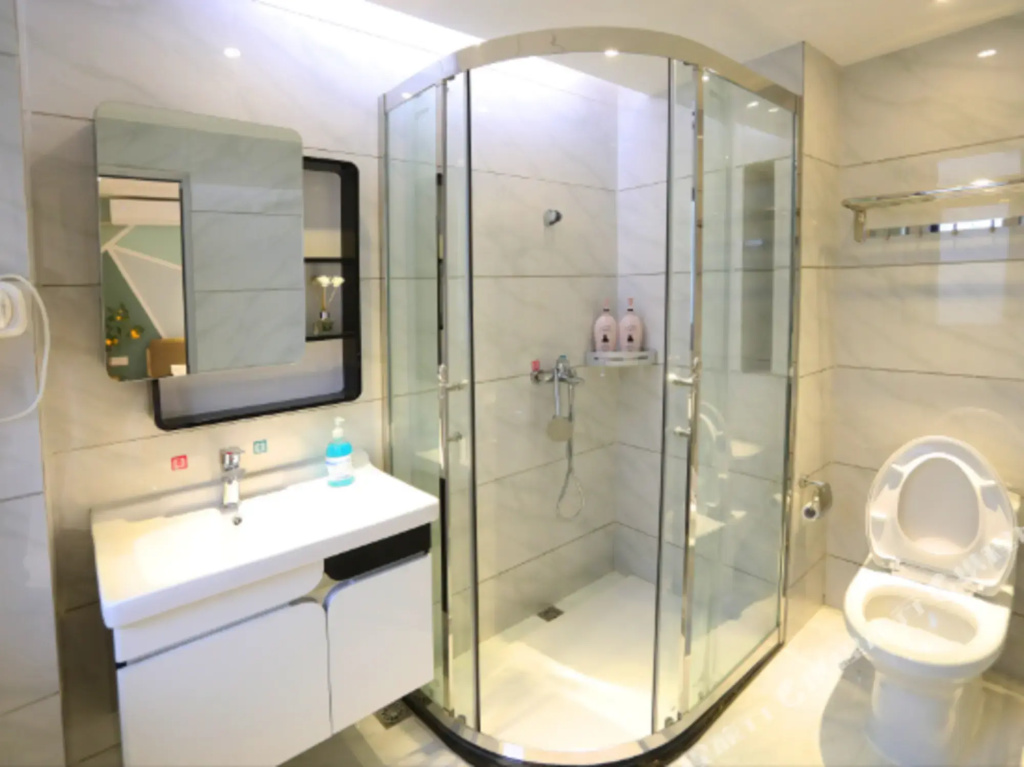 Manfei Theme Apartment (Meizhou wanda plaza Branch)