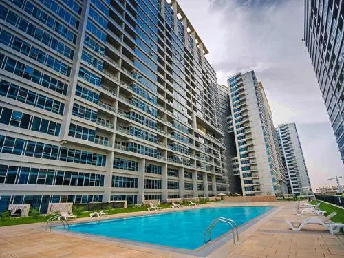 The Dubai Holiday Home, spacious 2 Bedroom Apartment, podium landscape view