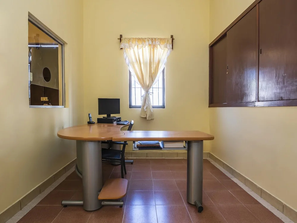 Capital O Las Calzadas Hotel & Suites
