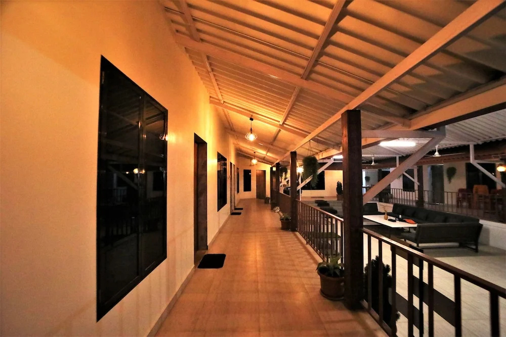 Whispering Palms by StayVista - Pool-view villa with Boutique interiors, Terrace & Lawn
