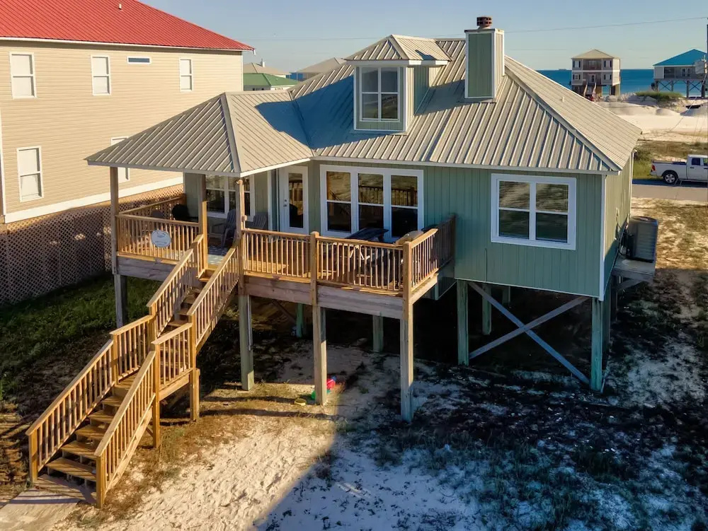 Tropical Paradise - North Side Beach Beauty! Pet Friendly - Swimming, Kayaking, Boating Or Fishing Are Just Steps Away! 4 Bedroom Home by RedAwning