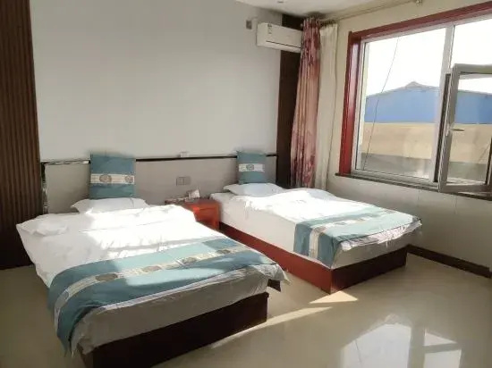 Pianguan Laoniuwan Business Hotel