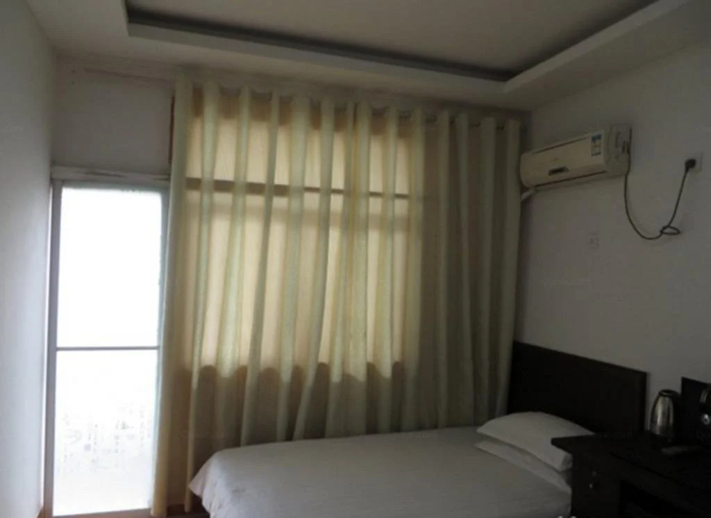 Junhe Tianranju Inn