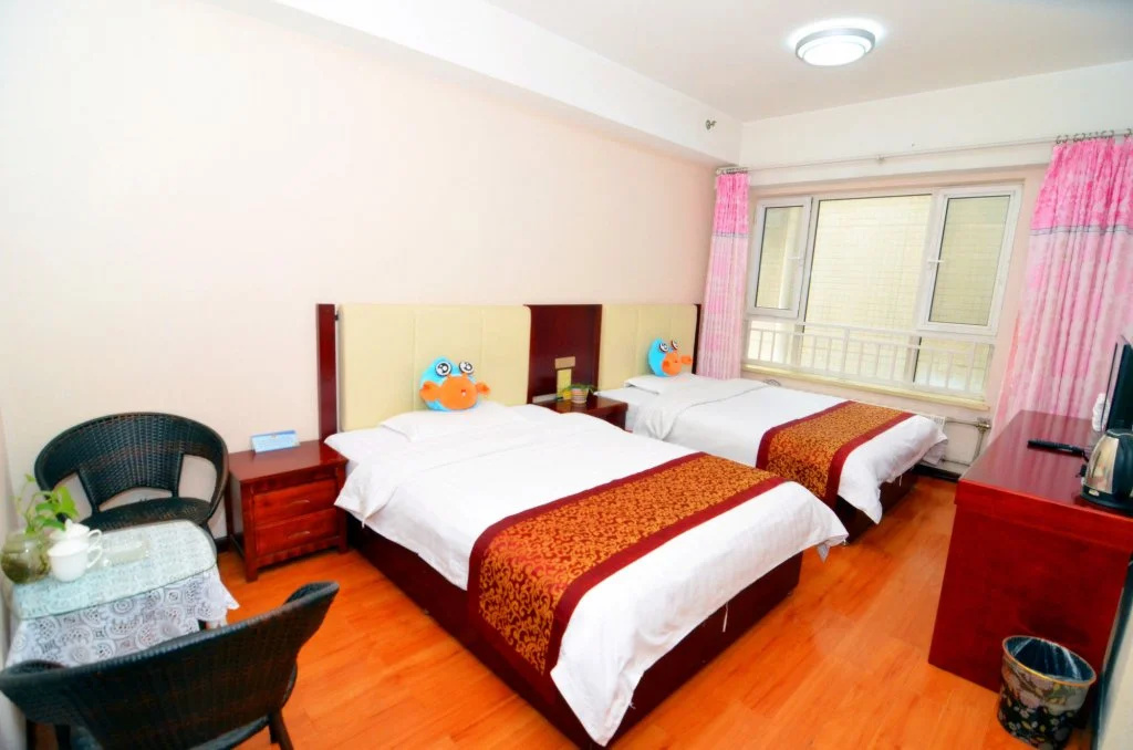 E Home Aparthotel