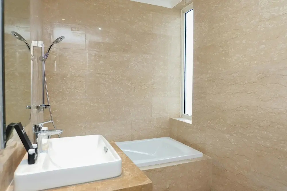 Highest Value Studio Room at Menteng Park Apartment By Travelio