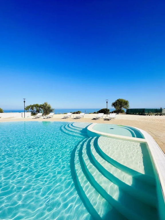 ISA-Residence with swimming-pool in Isola Rossa, apartments with air conditioning and private outdoor area