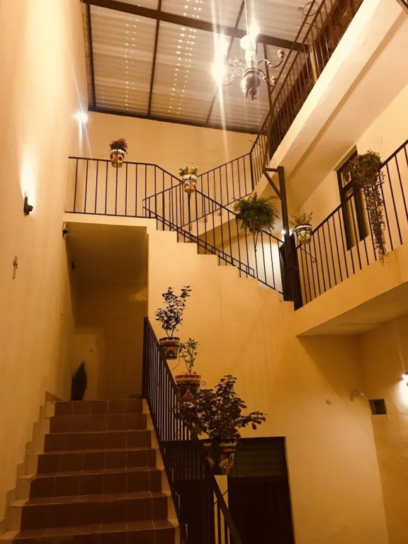 Capital O Las Calzadas Hotel & Suites