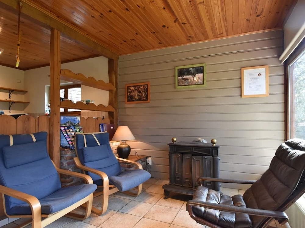 Nestled In A Green Scenery, This Chalet Along The River Is Perfect To Chill Out!