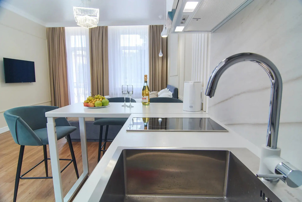 V Tsentre Goroda Flat 1