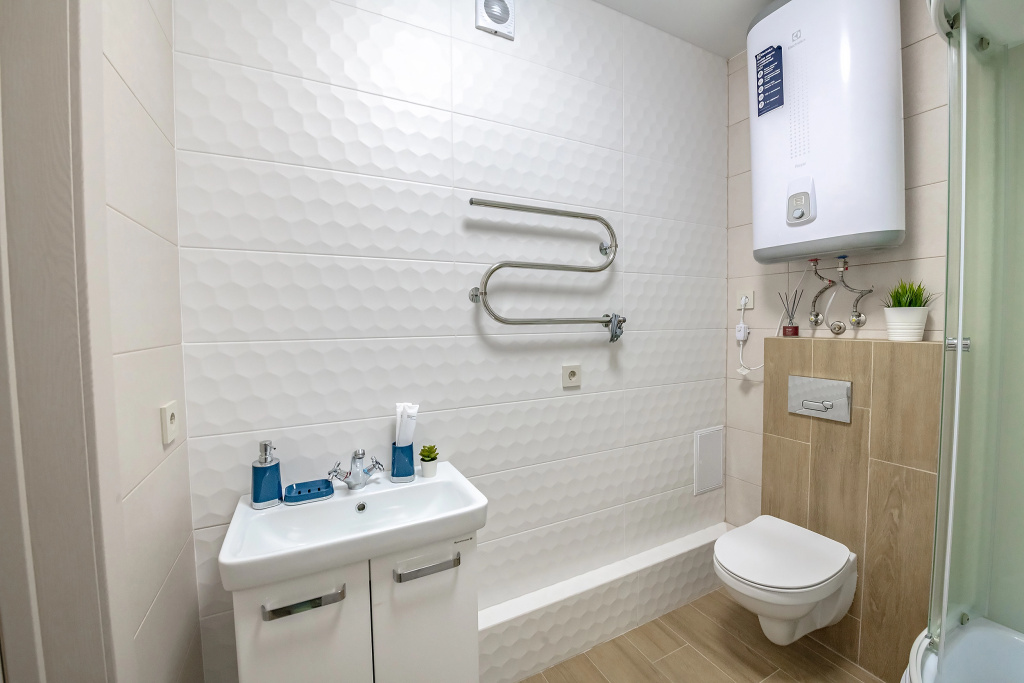 Апартаменты TopHouse на Каплунова 10 трёхкомнатные