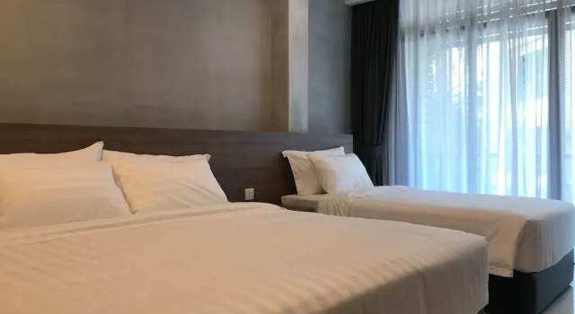 Luksusowy trzyosobowy pokój i balkonem Dandelion Inn