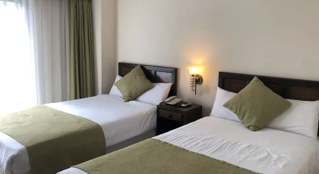 Двухместный номер Deluxe с балконом Holiday Saipan Hotel