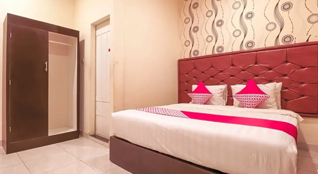 Номер Deluxe OYO 1117 New Garuda Hotel