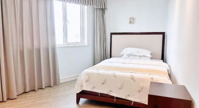 Семейный люкс с 3 комнатами с видом на море Yimi Yangguang Seaview Holiday Apartment
