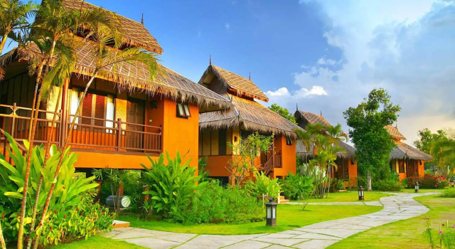 Кровать в общем номере Pai Hotsprings Spa Resort