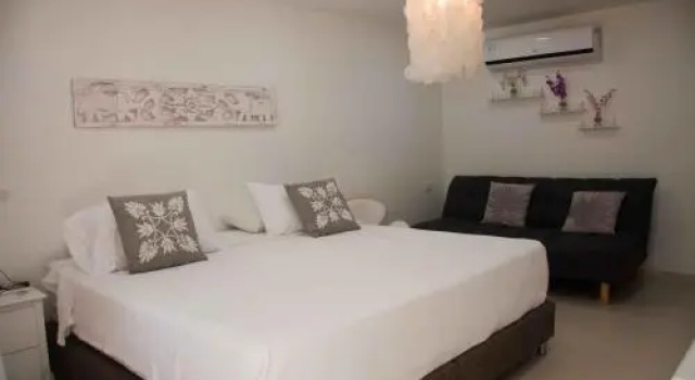 Le Castel Blanc Hotel Boutique, Забронировать Бутик-отель Бутик-отели Сан-Андрес, рядом с Торговый район Норт-Энд, Бутик-отель
