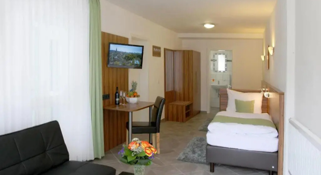 Четырёхместный номер Standard Hotel Garni Goldene Traube