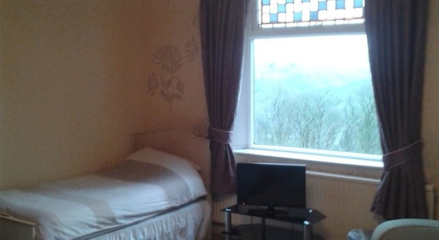 Четырёхместный семейный номер Standard с видом на сад Oakfield Lodge Guest House Stockport