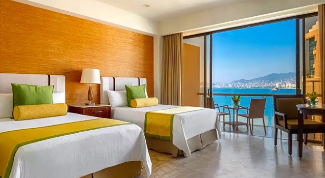 Четырёхместный клубный номер Deluxe с частичным видом на океан Grand Hotel Acapulco