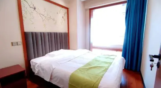 Семейный люкс Muhai Lvsu Seaview Apartment (Development Zone Shibeiwan Water Park Branch)