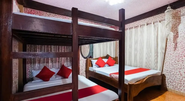 Кровать в общем номере OYO 391 Kakay Beach Resort And Hotel