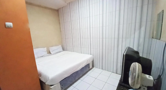 SPOT ON 91186 Losmen Yanti