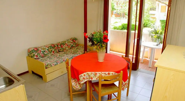 Апартаменты c 1 комнатой с балконом Flat in Lignano Pineta