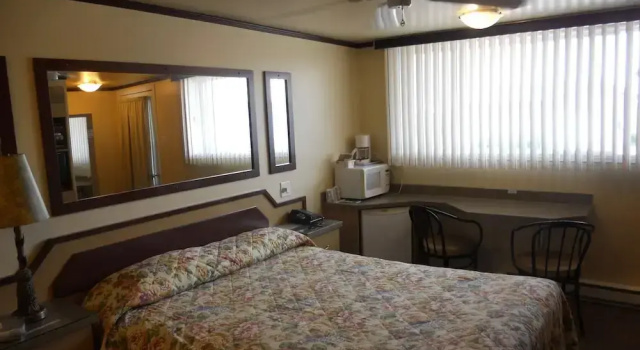 Четырёхместный семейный номер Standard с 2 комнатами с видом на сад Motel Normandie
