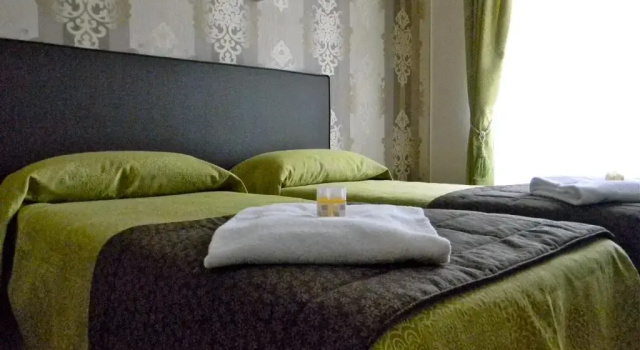 Трёхместный номер Rome Kings Suite