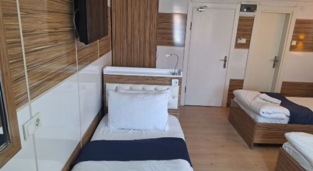 Standardowy czteroosobowy pokój Dilmac Hotel